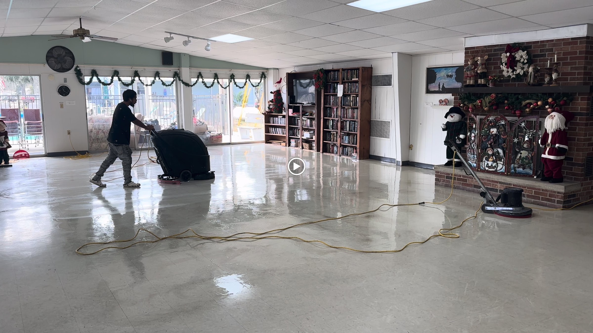 Commercial auto-scrubber running on tile floor