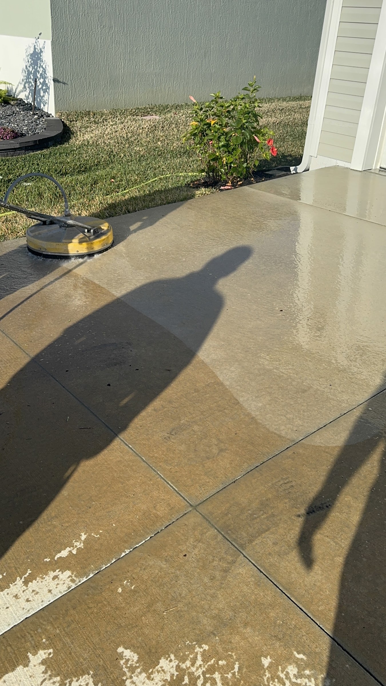 Patio before and after commercial pressure washing